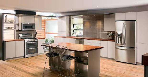 Modern open kitchen with double Whirlpool refrigerator