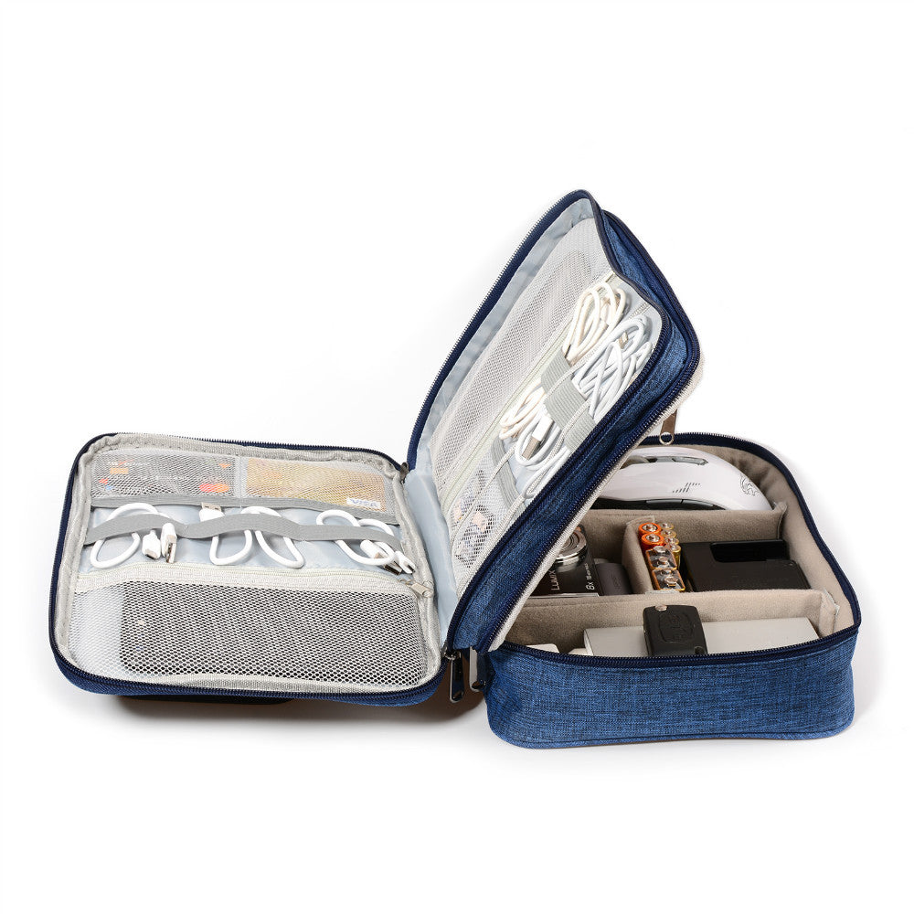 Portable blue electronics organizer case open with cables, batteries, and chargers inside
