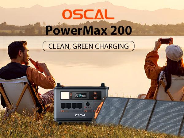 Portable solar generator and foldable solar panels by a lake with two people outdoors at sunset