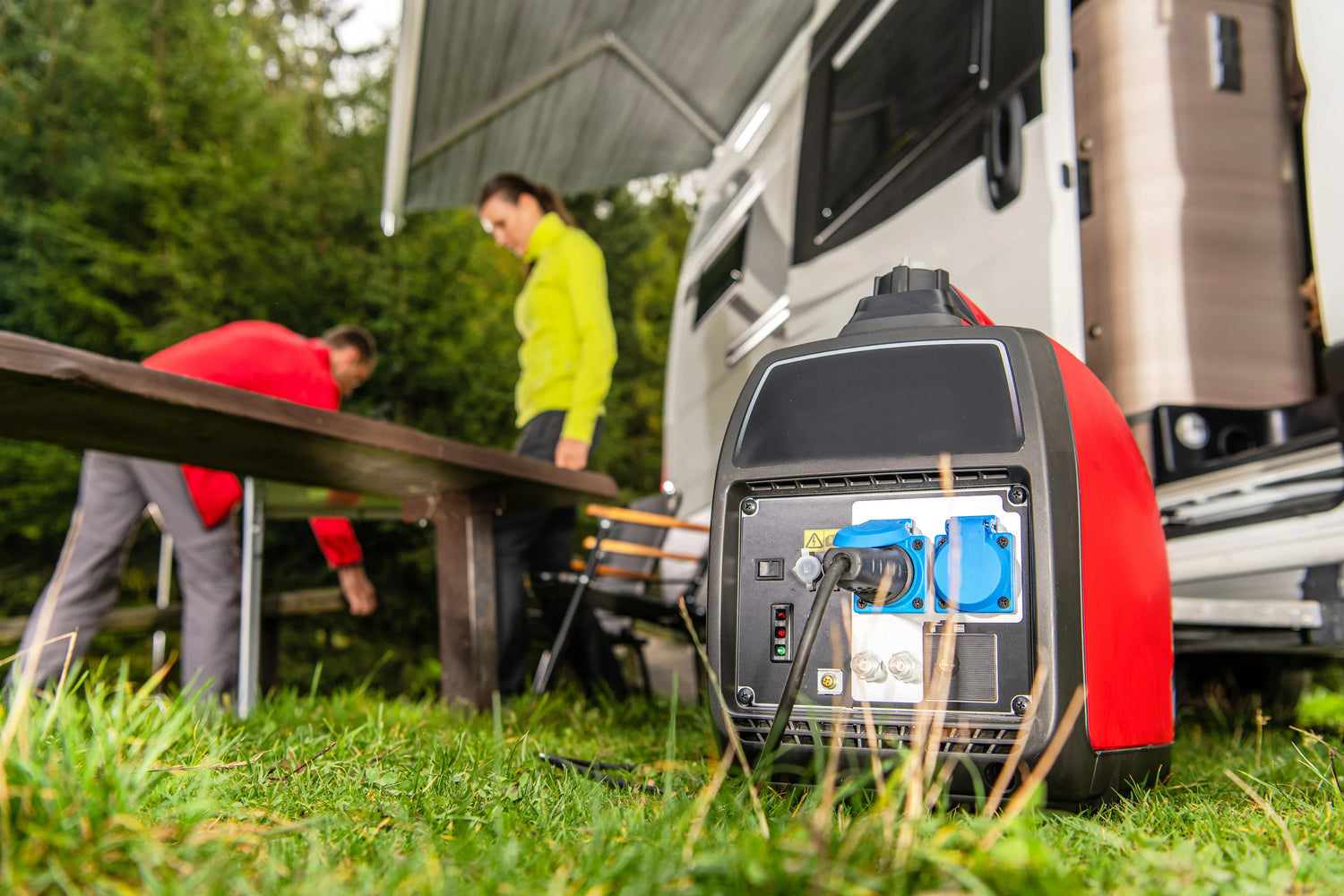 Portable camp generator next to camper van with people outdoors, reliable RV power solution