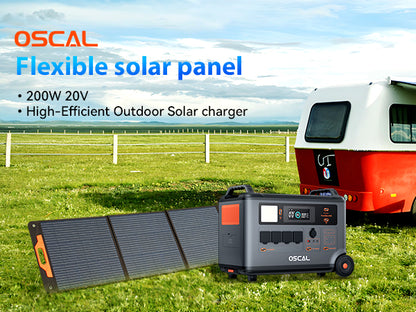 Flexible solar panel and portable generator for outdoor use near a camper trailer on grass