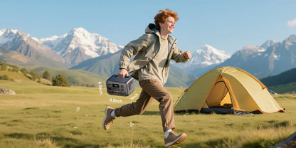 A person runs outdoors while carrying the BLUETTI Elite 30 V2 Portable Power Station, set against mountains and a yellow tent.