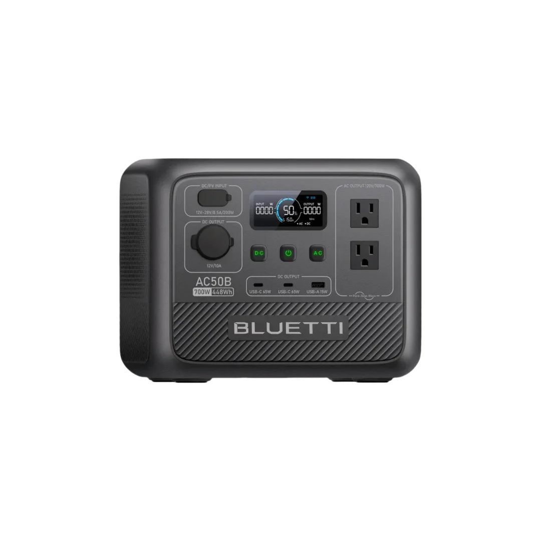 Portable BLUETTI AC50B power station in black, featuring dual AC outlets, multiple USB ports, and a display screen for monitoring.