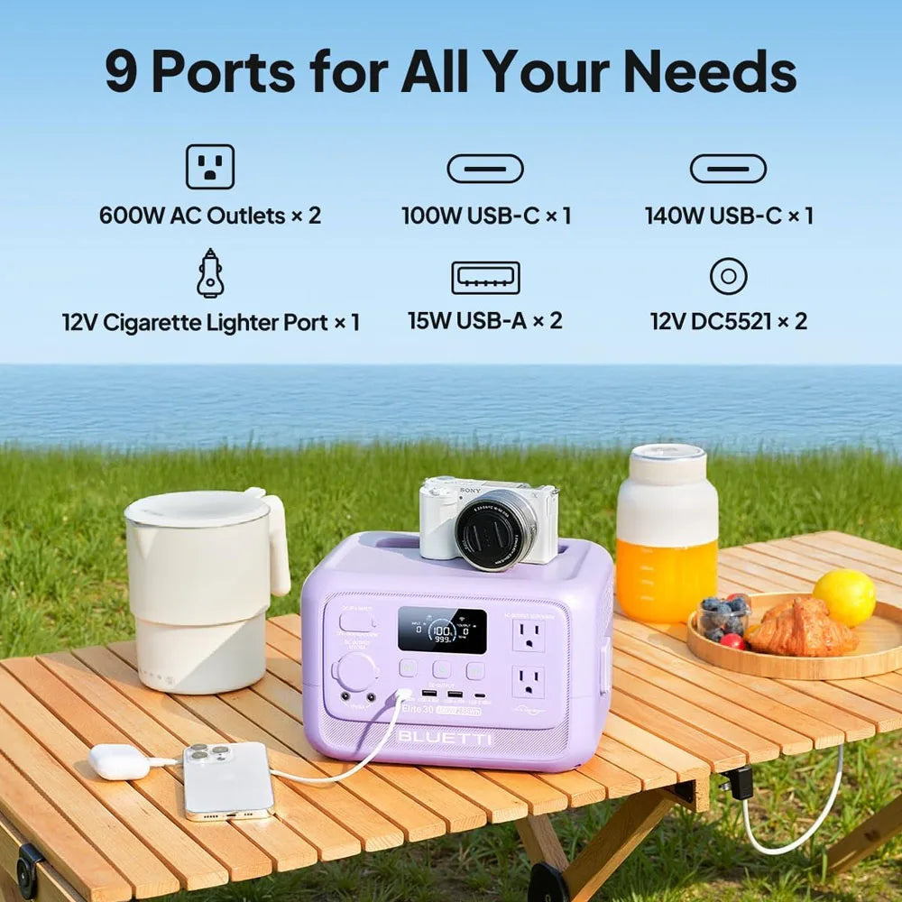 Portable BLUETTI Elite 30 V2 solar generator in lavender, featuring multiple outlets on a wooden table outdoors, with camera and drinks.