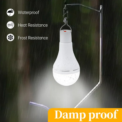 Rechargeable Solar Camping Light with remote control, featuring a waterproof design and a white bulb shape, hanging from a hook.