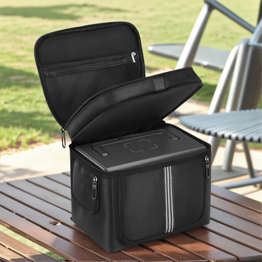 Black carrying case for BLUETTI EB3A power station, featuring a waterproof fabric, zippered closure, and handle.