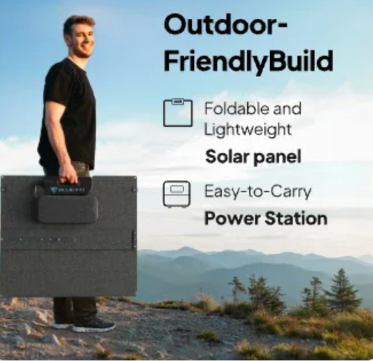 Man outdoors carrying foldable solar panel and portable power station with mountain view.